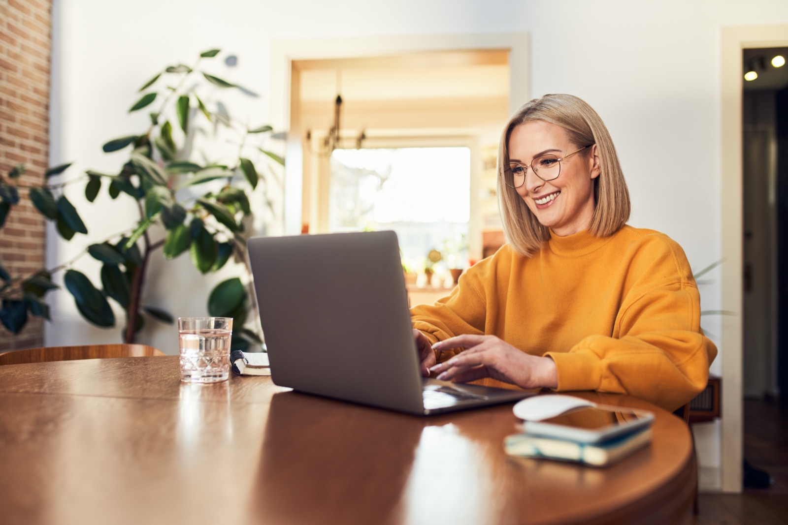 A resident working from home on a laptop